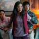 A mom (Michelle Yeoh) protects her family in Everything Everywhere All at Once.